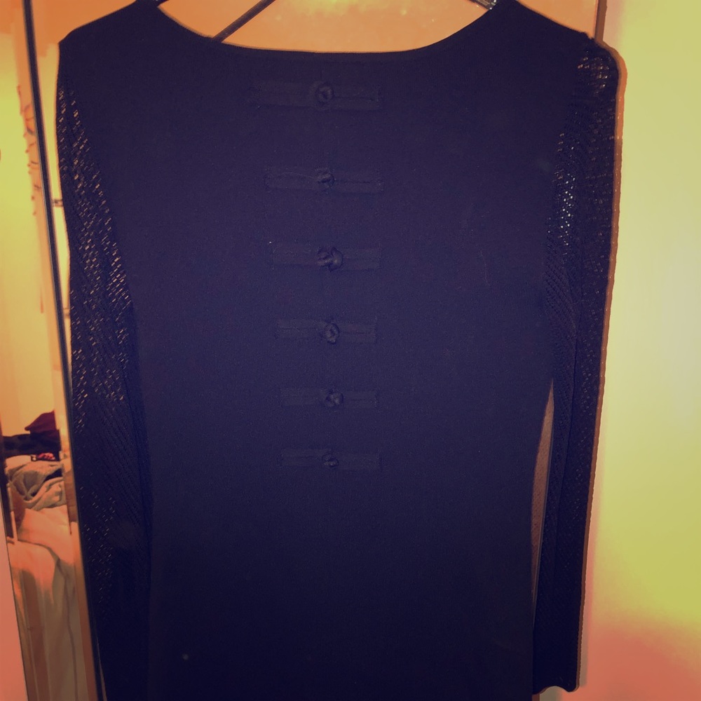 Black form fitting dress with sleeves